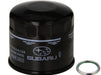 Black Subaru oil filter with a metal gasket on a white background