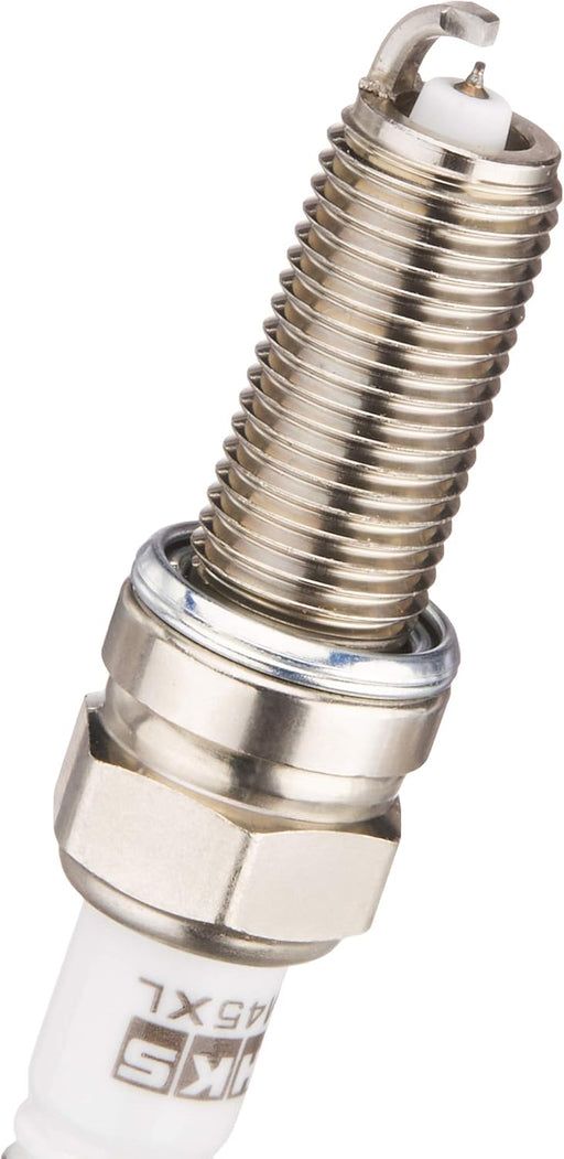 Spark plug with visible branding on a white background