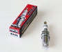 A pack of HKS SUPER FIRE RACING M45iL spark plugs with one plug displayed in front of the packaging.