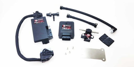 Automotive parts including a black box with wiring on a white background