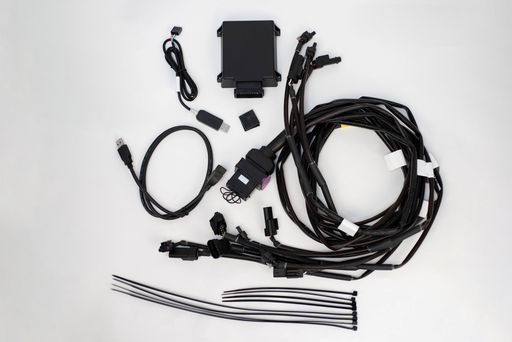 Car wiring harness kit on a white background Fabspeed Ferrari 296 OPF Monitor