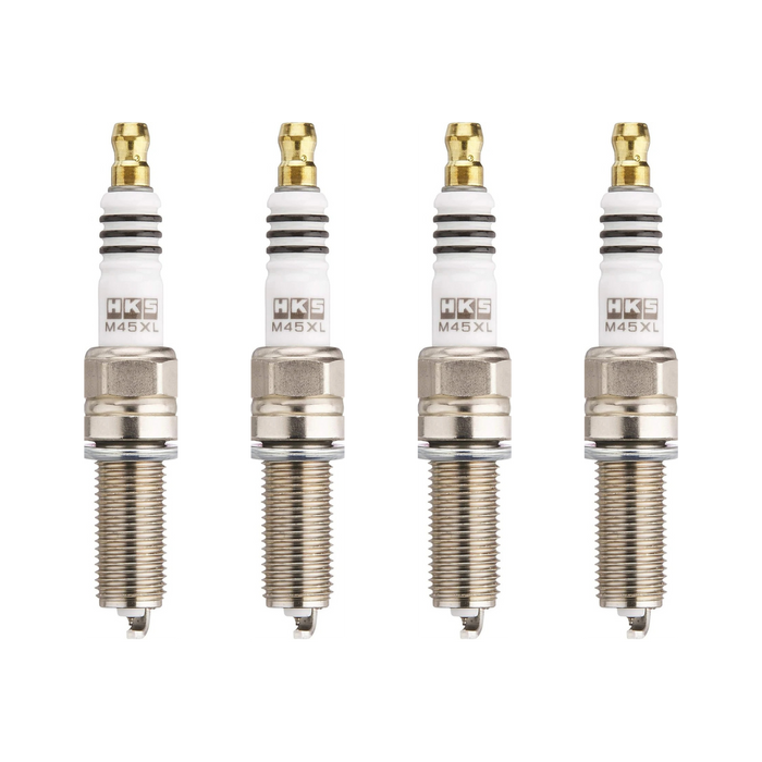 Four HKS spark plugs on a white background