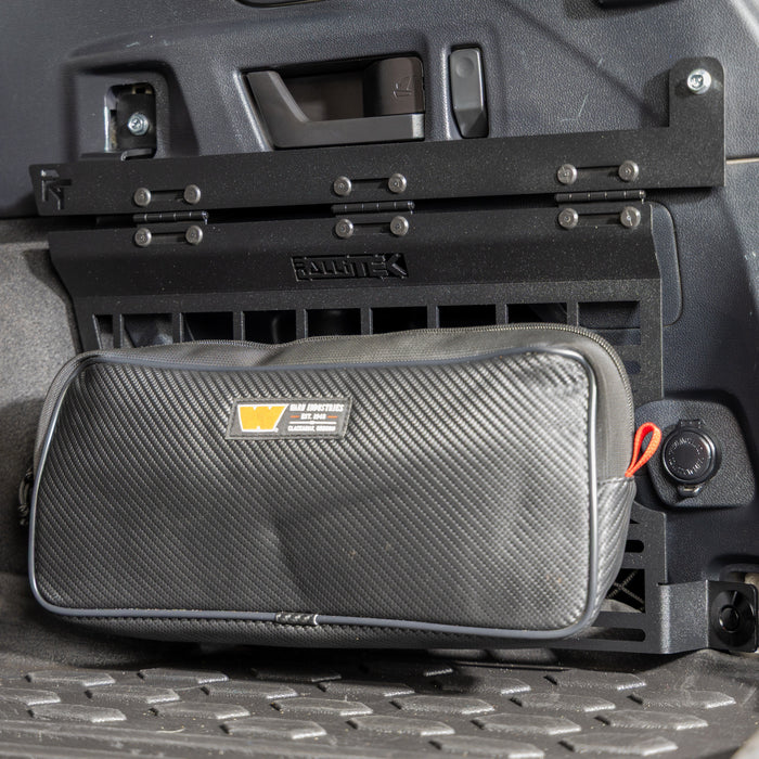 subaru outback molle panel installed in rear cargo storage area with molle bag mounted