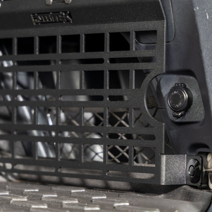 subaru outback molle panel installed in rear cargo storage area closeup of access to 12v accessory plug